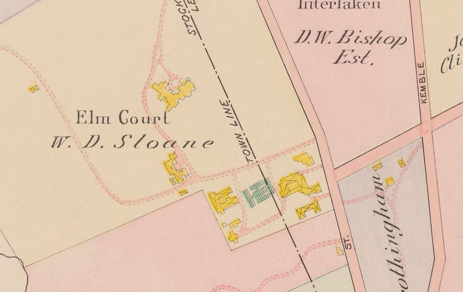Elm Court on plate 22: the house and its wings in yellow for wood, the stable court and barns cross-hatched, and to the right a green range of six or seven glasshouses ruled off one from another — standing, as it happens, directly on the Lenox and Stockbridge town line.