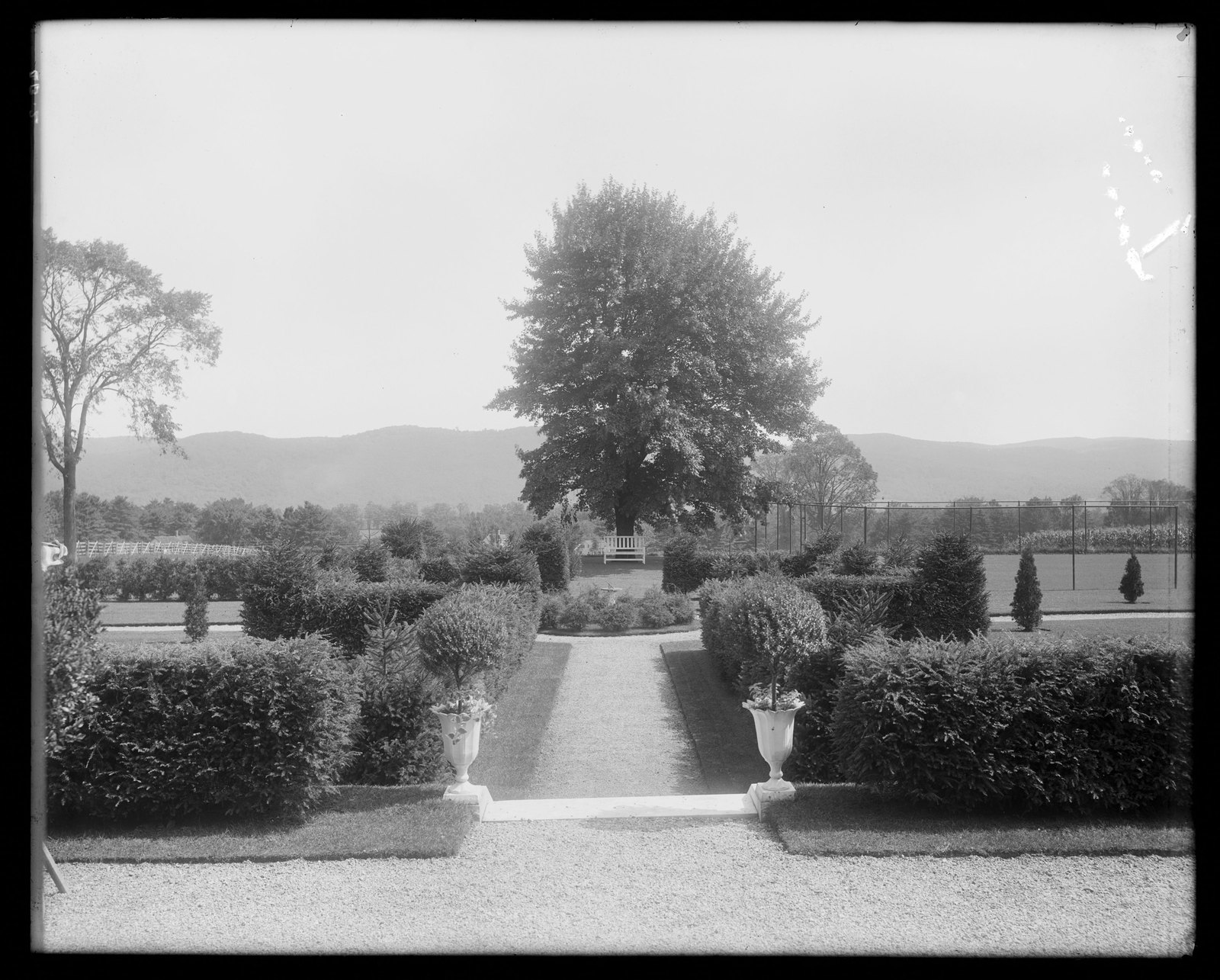Coldbrook: garden and tennis court. About 1892–1915.
