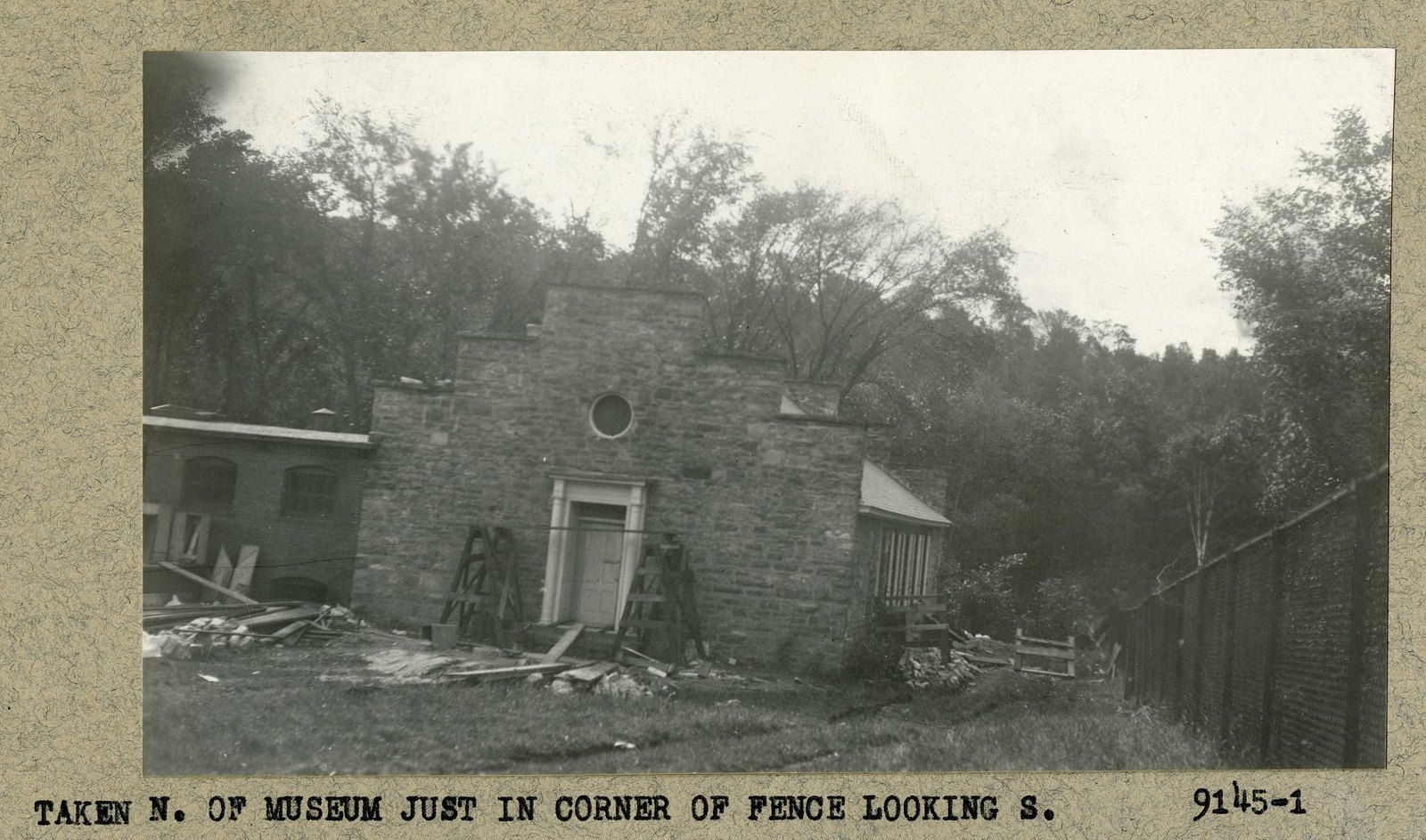 “TAKEN N. OF MUSEUM JUST IN CORNER OF FENCE LOOKING S.” Print 9145-1.