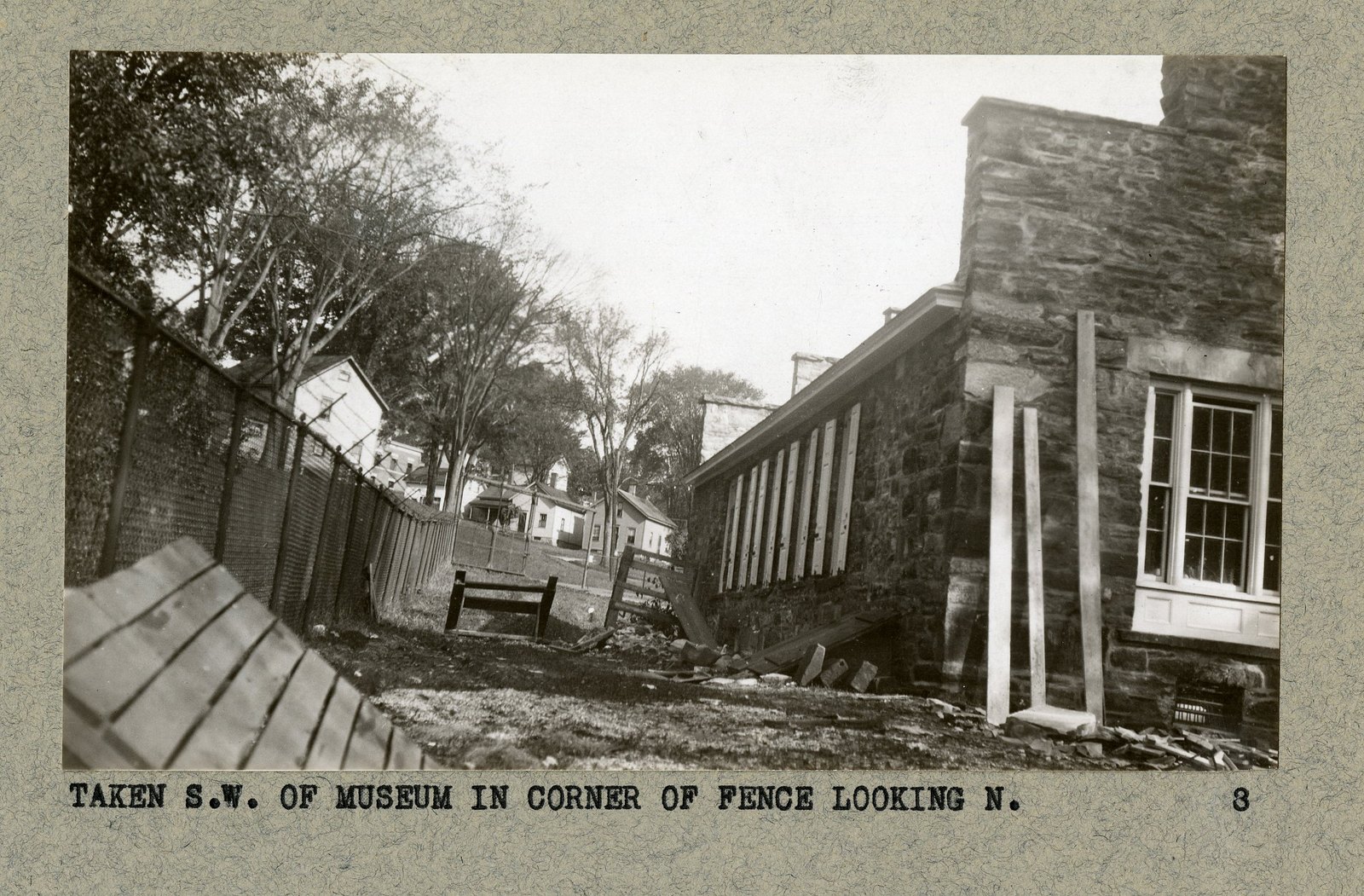 “TAKEN S.W. OF MUSEUM IN CORNER OF FENCE LOOKING N.”