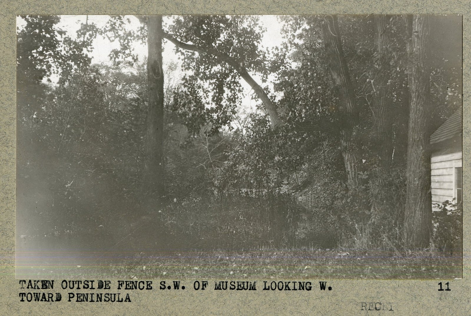 “TAKEN OUTSIDE FENCE S.W. OF MUSEUM LOOKING W. TOWARD PENINSULA.”