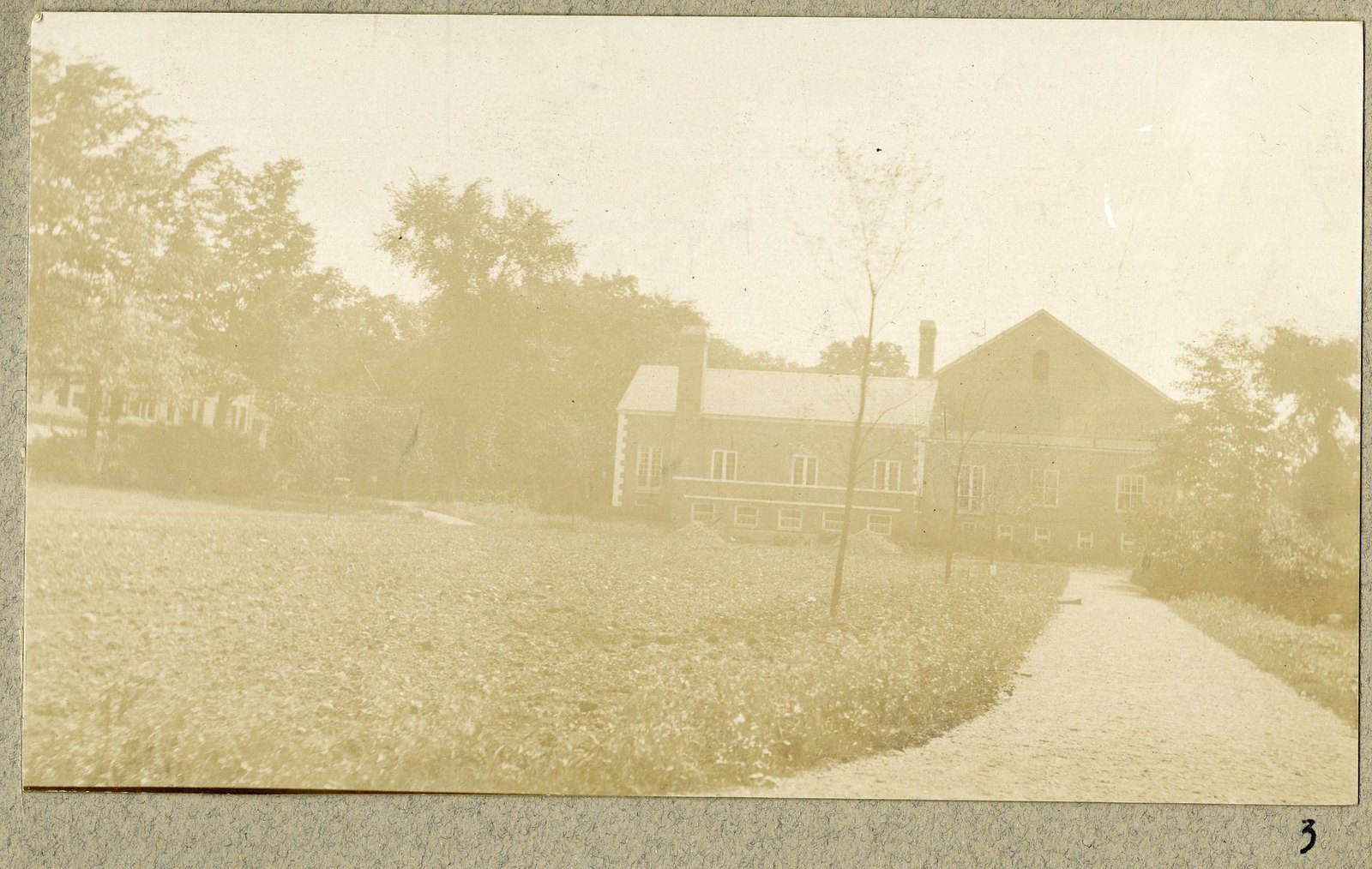 The Community House from the lawn, with the drive. Print 3.