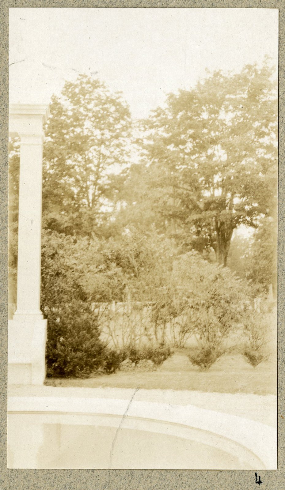 A column of the memorial, with the planting behind it. Print 4, captioned in the album “BY PARKER, SEPT 1925.”