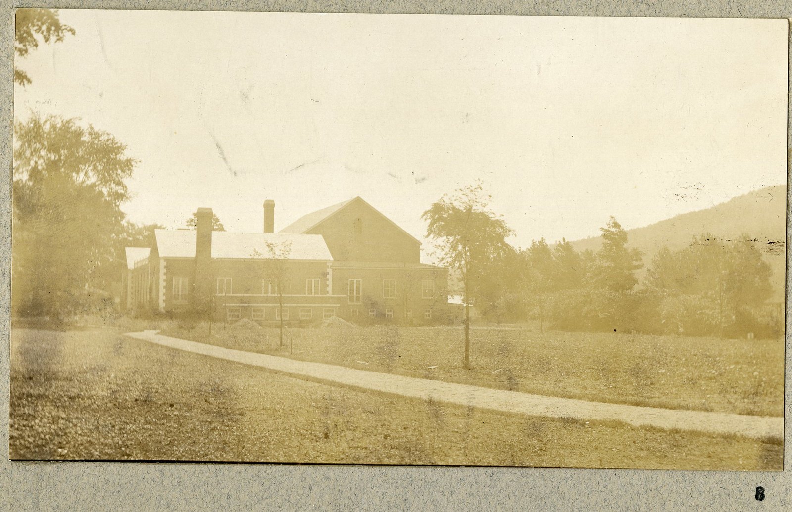 The Community House and the hills beyond. Print 8.