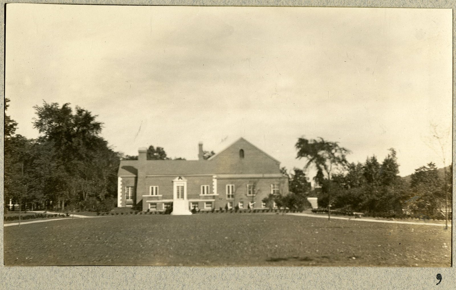 The Community House across the finished lawn. Print 9.