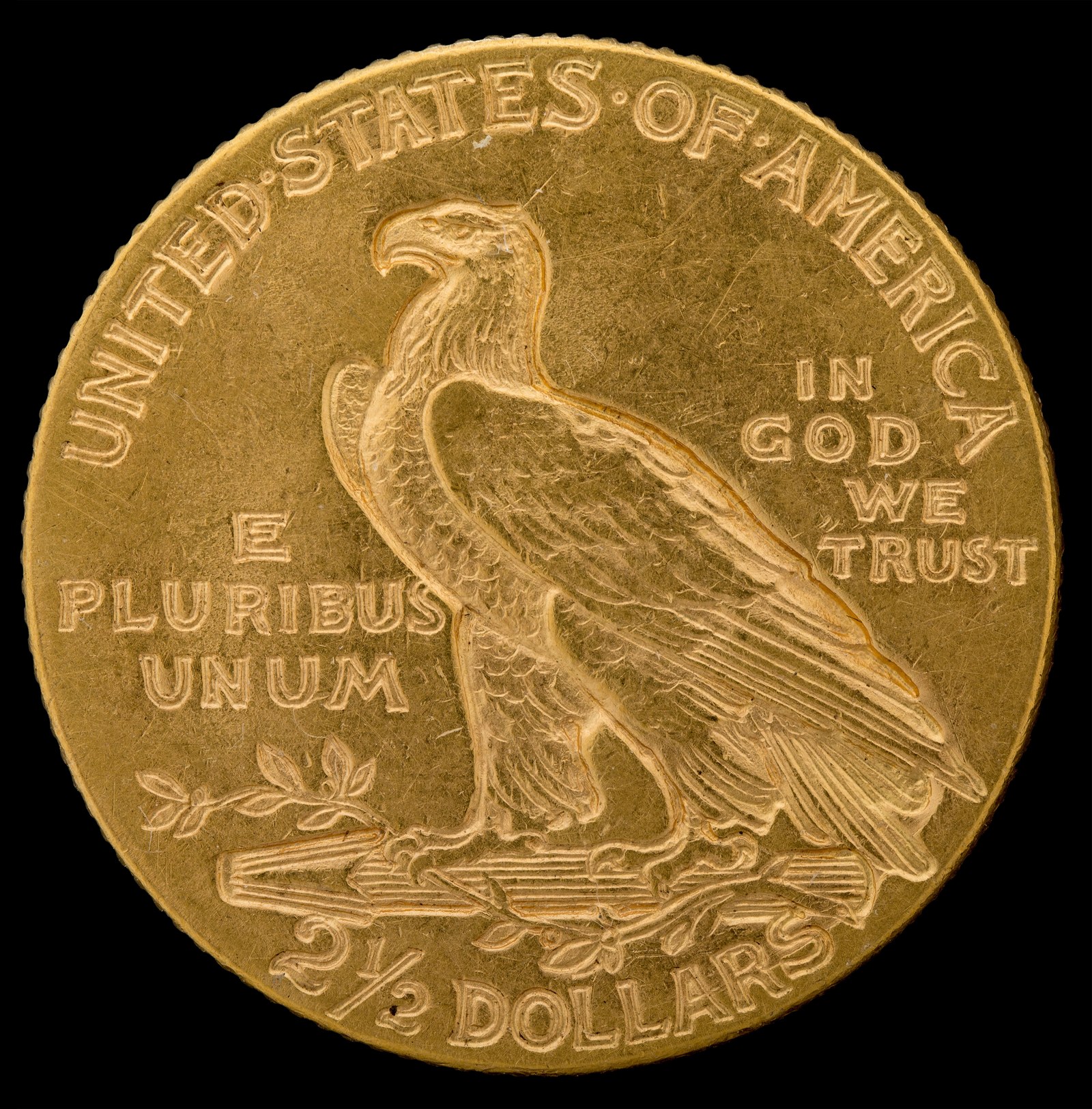 The incuse reverse: a standing eagle on a bunch of arrows, an olive branch in the left talon.