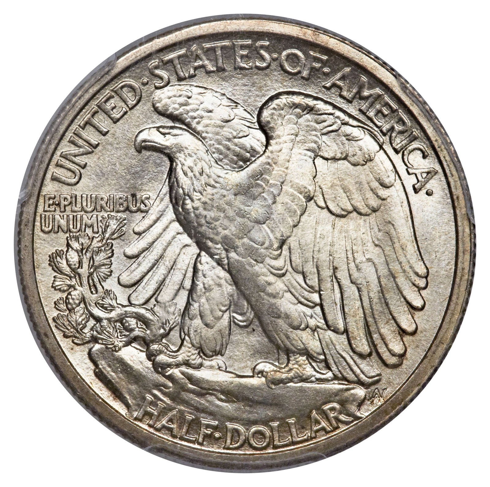 The reverse: a bald eagle rising from a mountain crag. This design was revived for the American Eagle bullion coin in 1986 and is still being struck.
