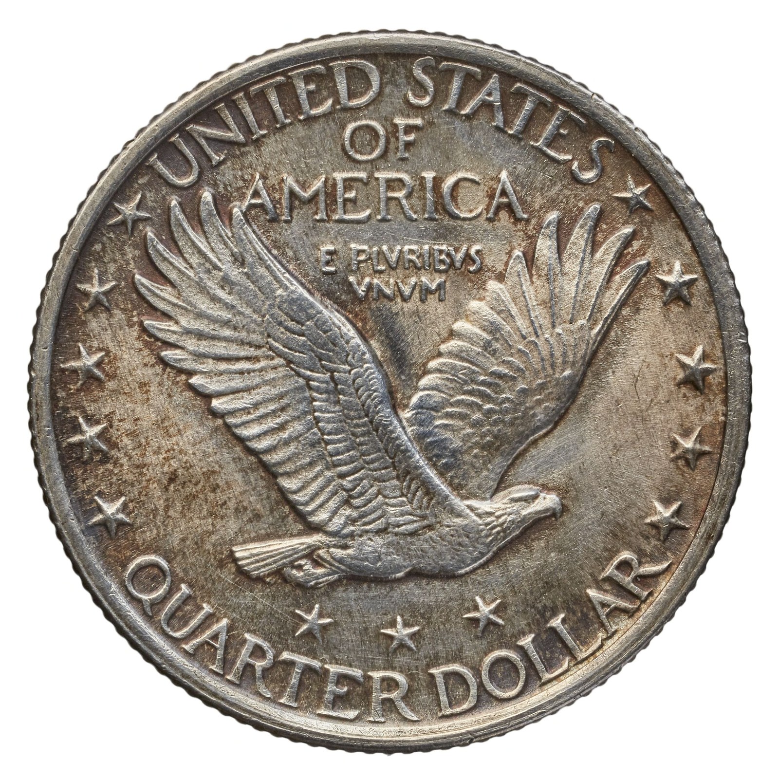 The reverse, an eagle in flight. By 1924 the date was wearing off the coin in circulation, and in 1925 the Mint recessed it into the design.