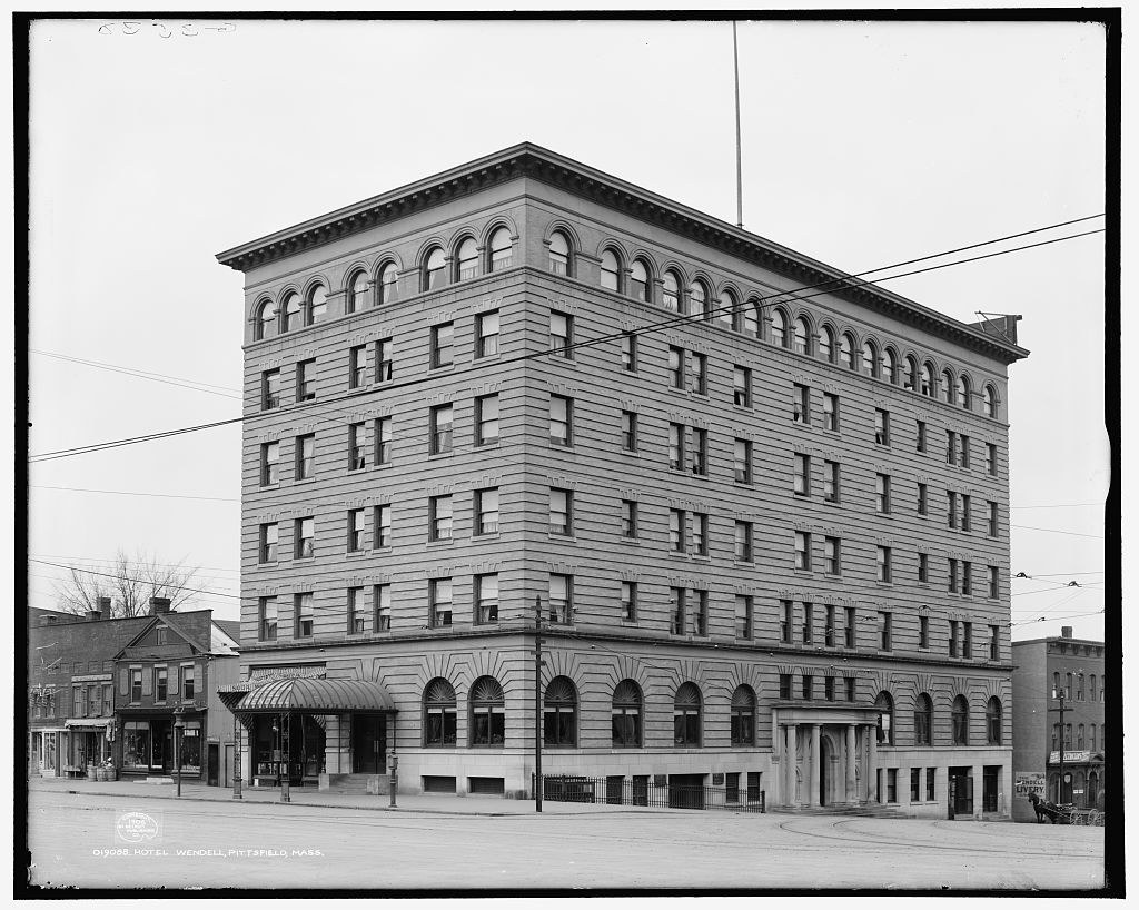 Hotel Wendell, Pittsfield, photographed by the Detroit Publishing Company. The atlas letters it THE WENDELL on plate 2, at the corner of South and West Streets, four blocks from the depot; the negative catches the trolley wires and, at the right, a sign for the Wendell Livery.