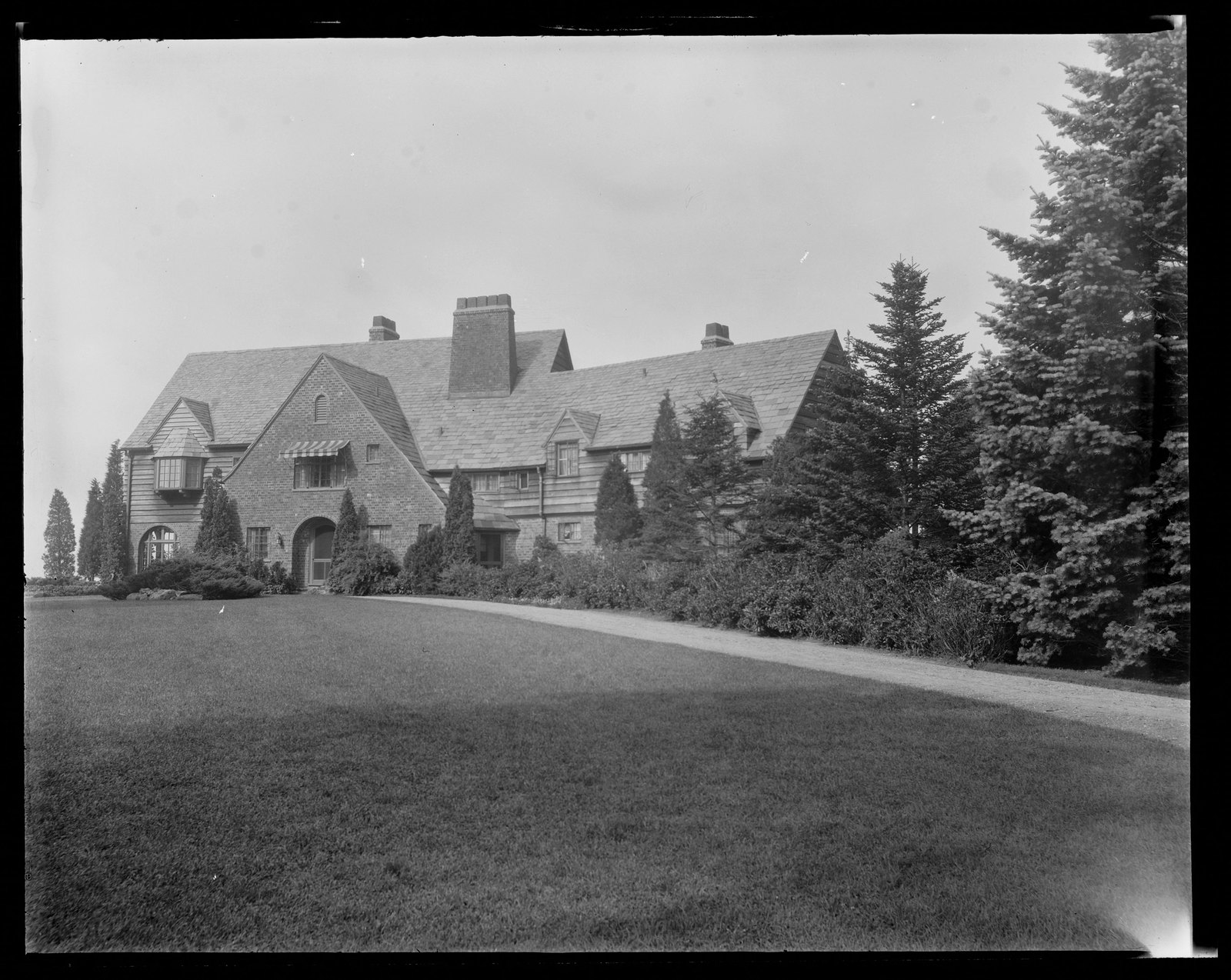 House & lawn. About 1925–1935.