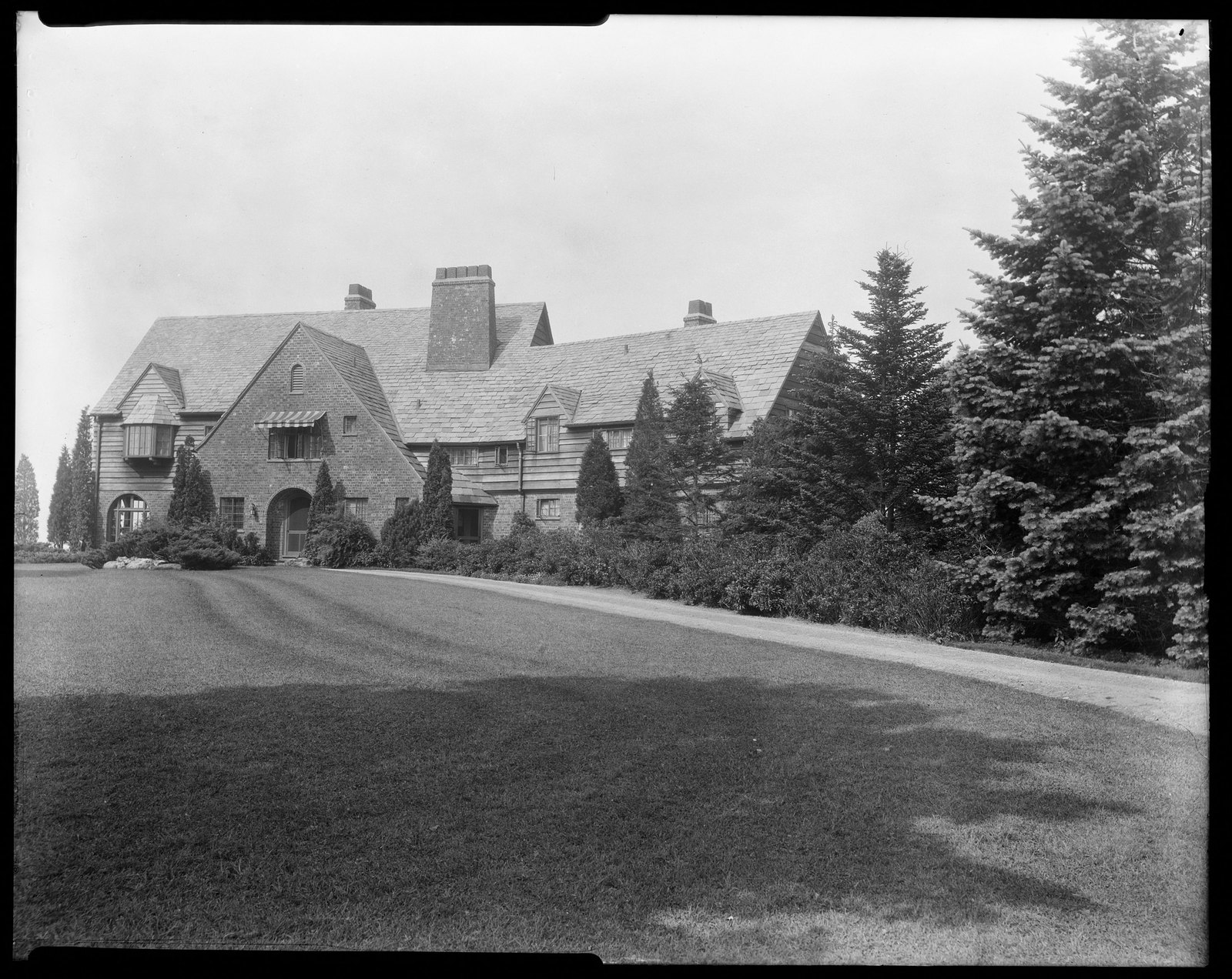 House & lawn. About 1925–1935.
