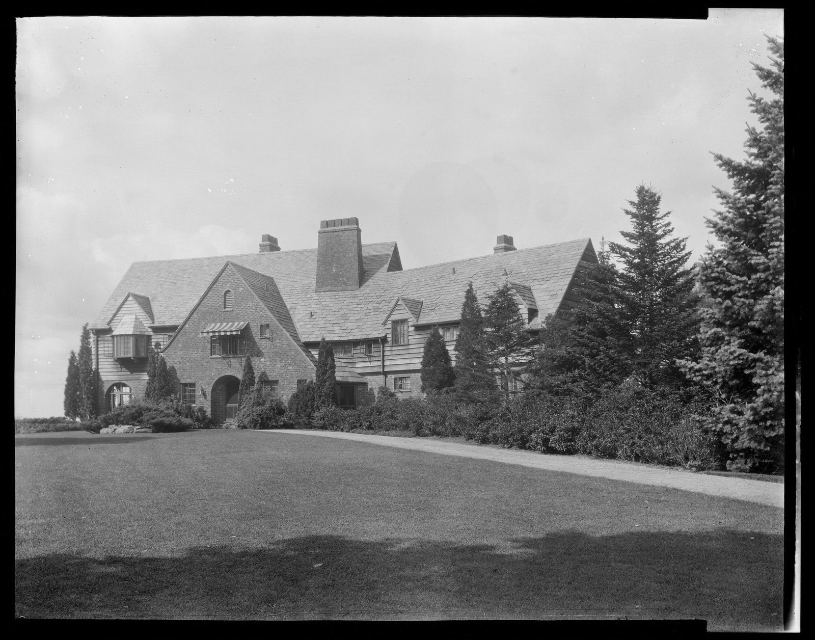 House & lawn. About 1925–1935.