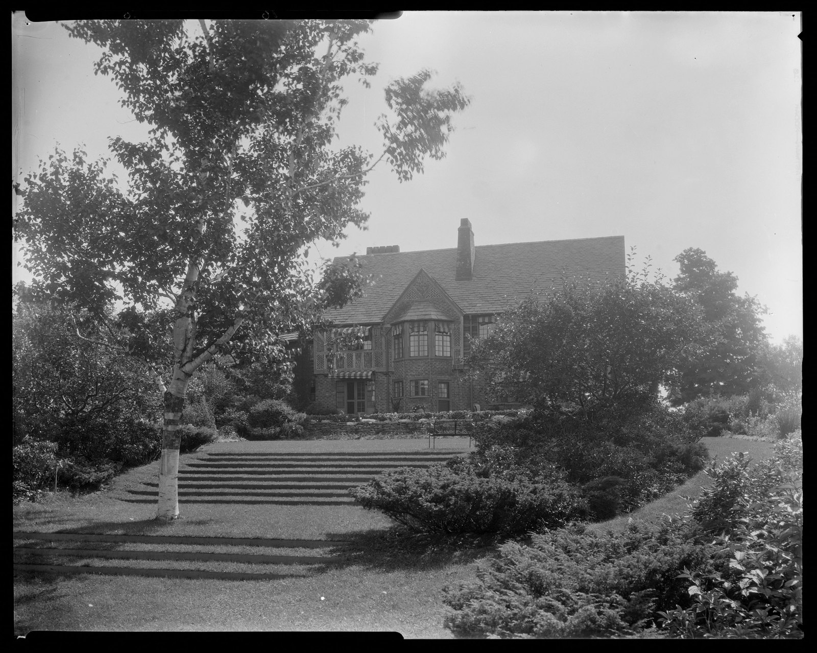 House & lawn. About 1925–1935.