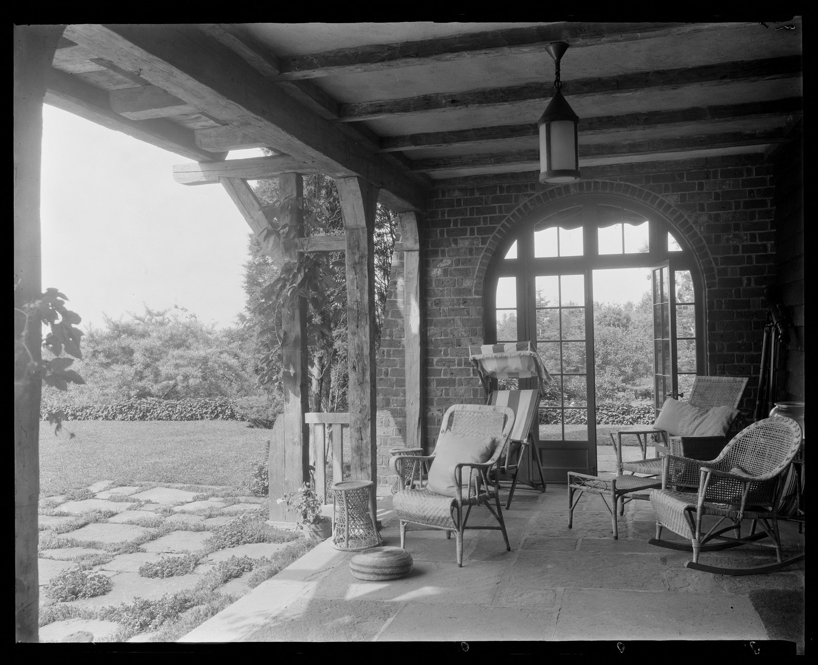 Veranda (patio) & lawn. About 1925–1935.