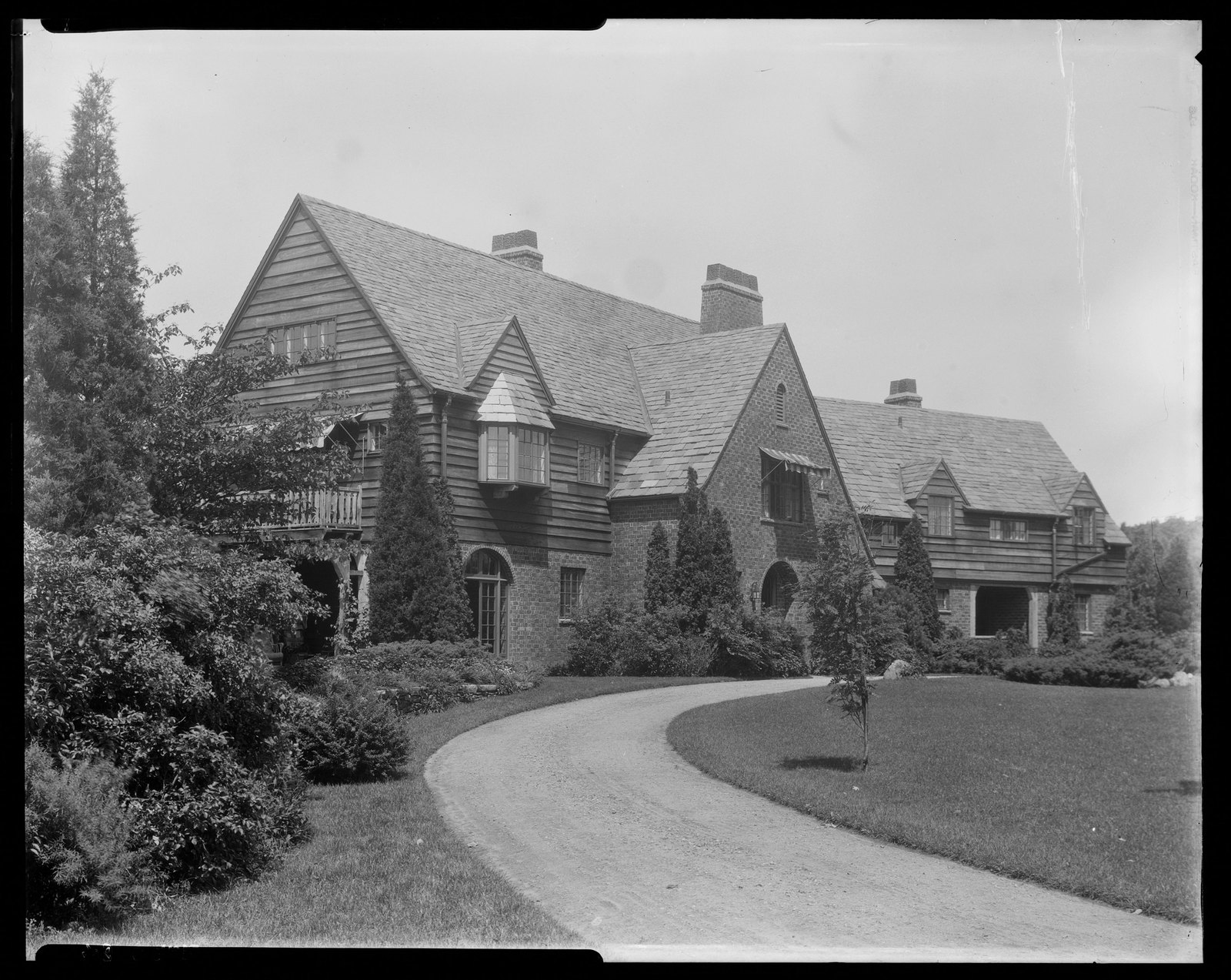 House & drive. About 1925–1935.