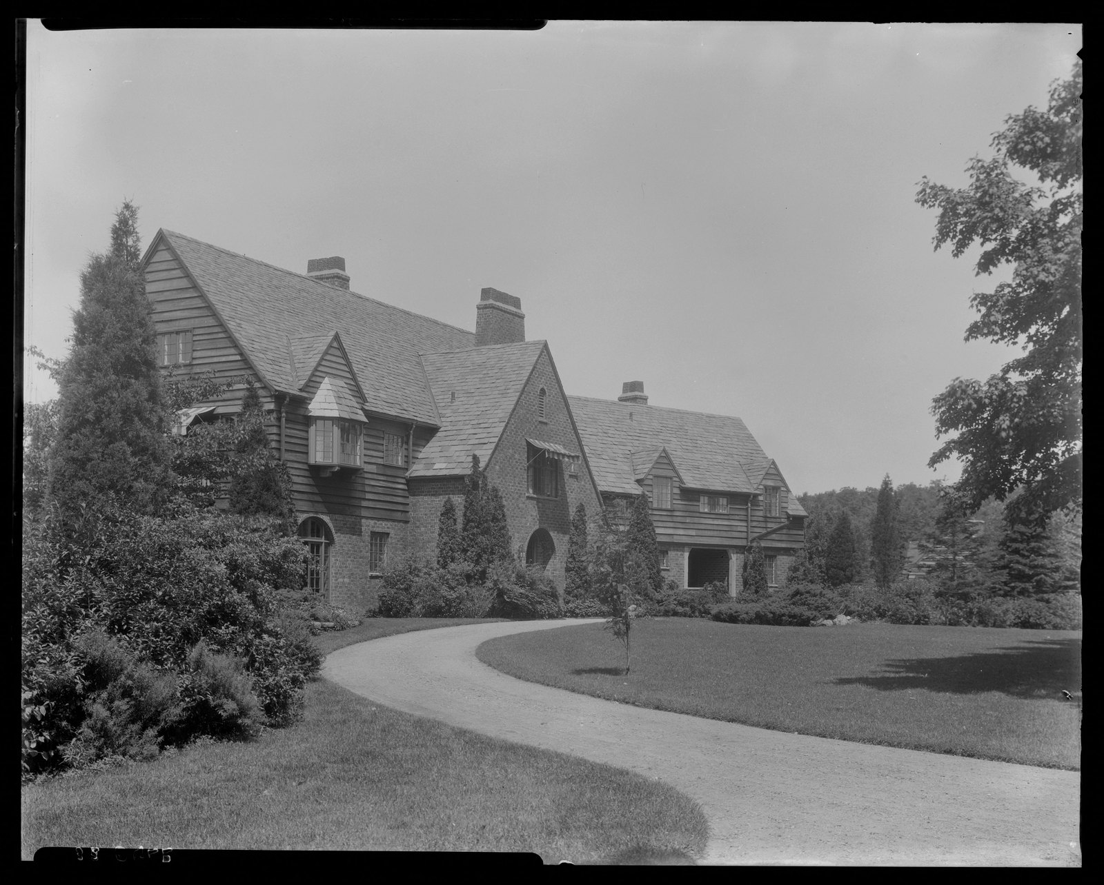 House & drive. About 1925–1935.