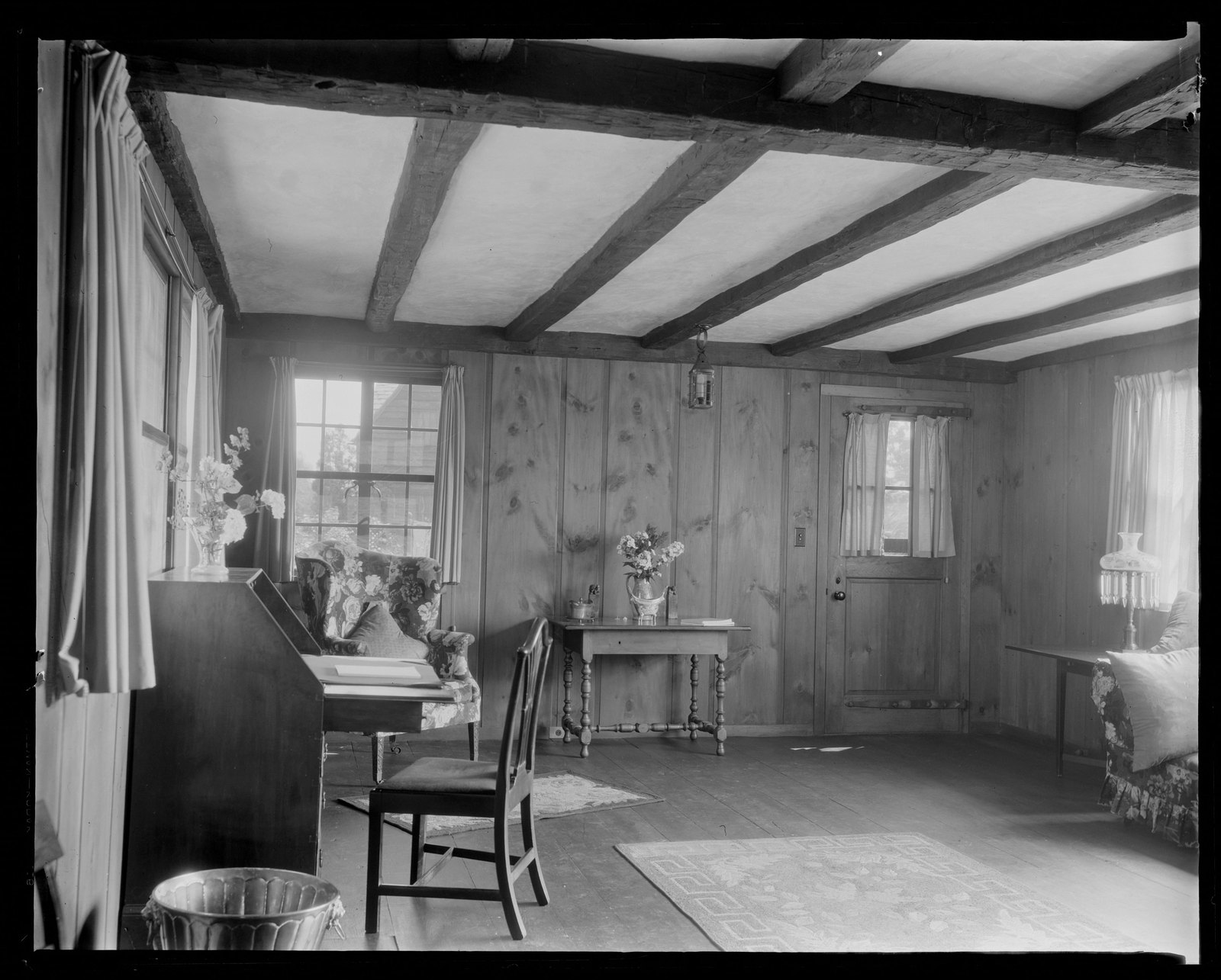 Interior of cottage. About 1925–1935.
