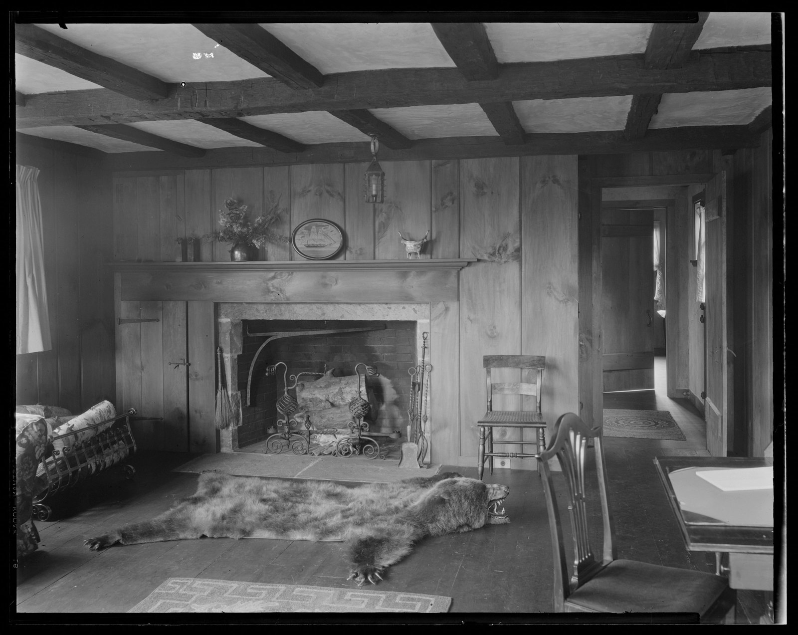 Interior of cottage. About 1925–1935.