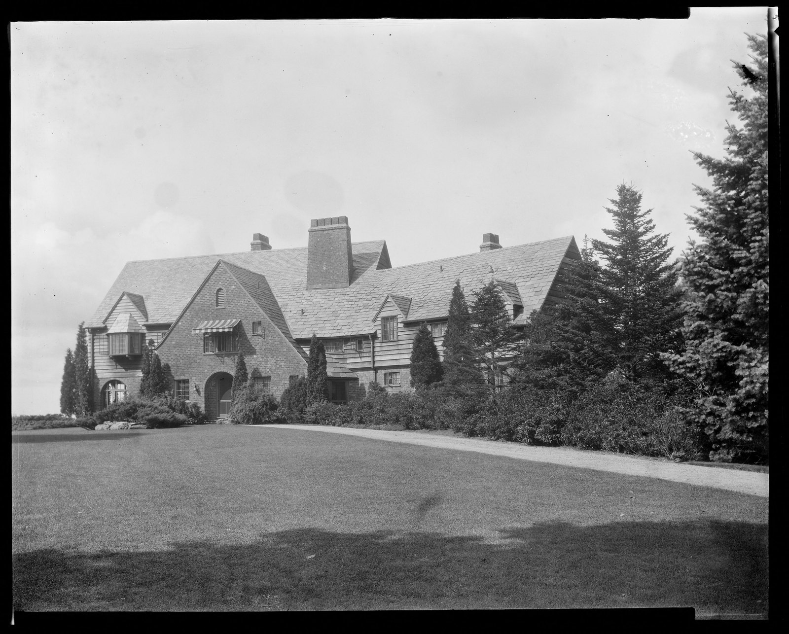 House & drive. About 1925–1935.