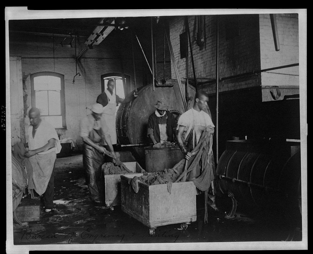 African American workers doing laundry at the Bureau of Engraving and Printing.