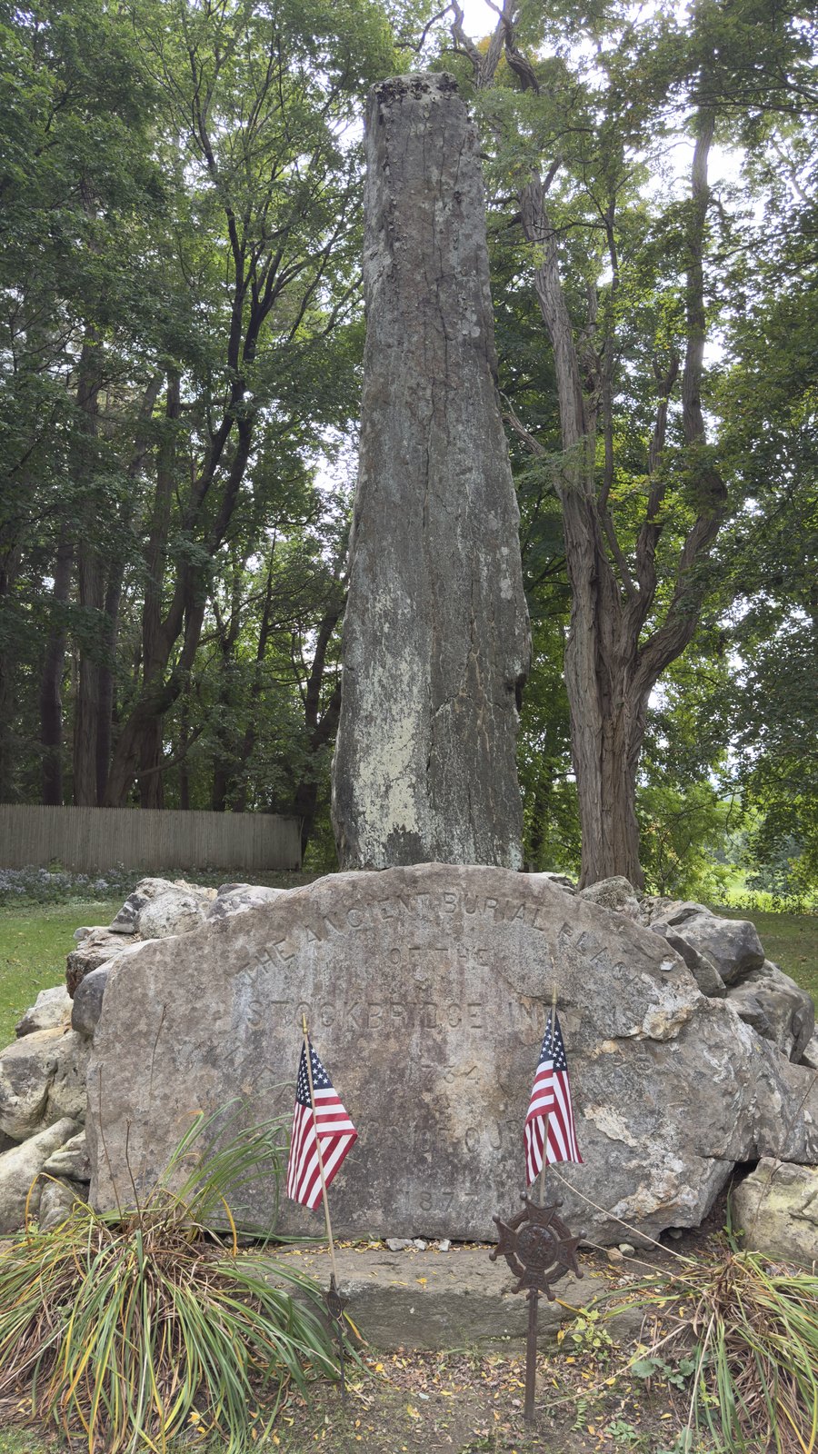 The Indian Monument at the west end of Main Street, raised in 1877 on its mound of fieldstone.