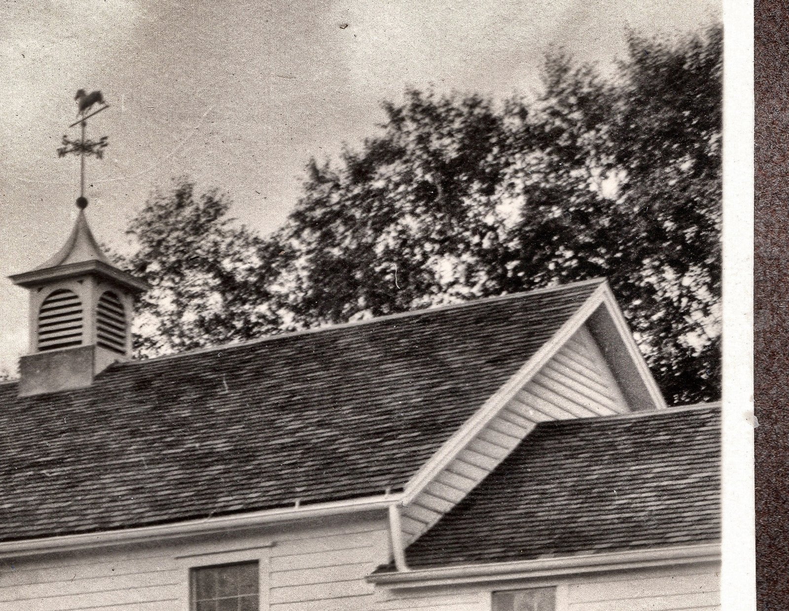 The cupola and weathervane over the roof ridge. 1934 run.