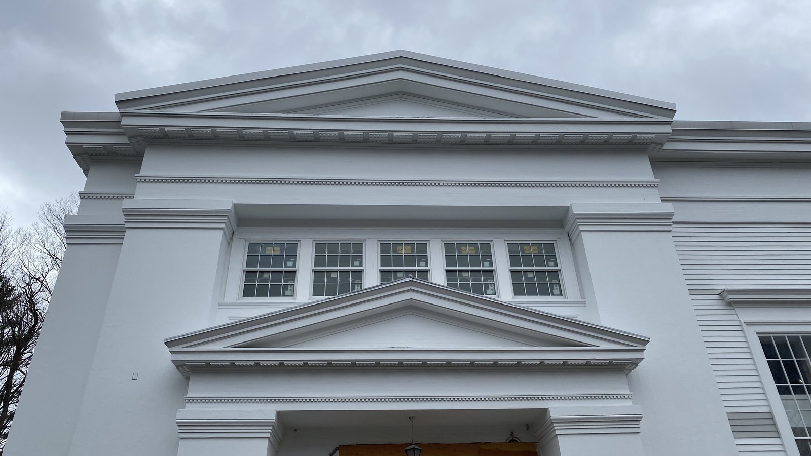 The restored pediment.