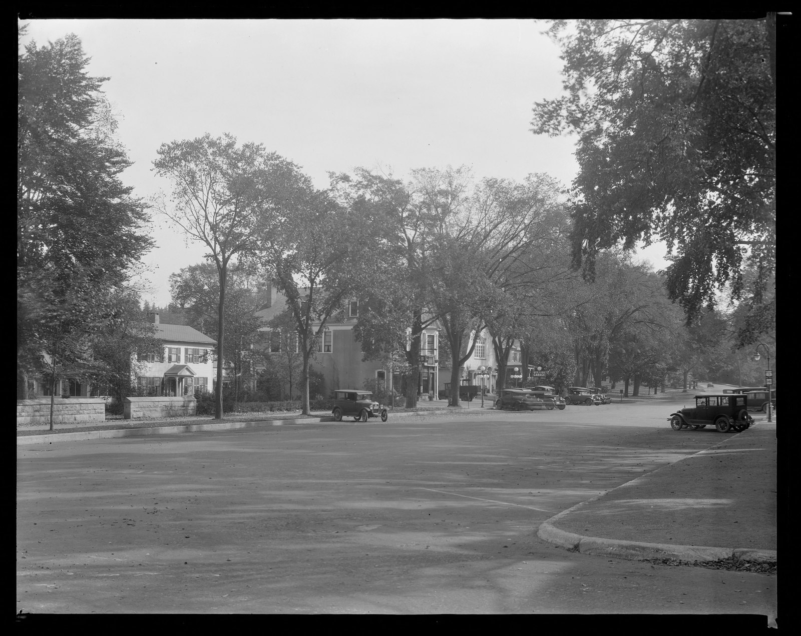 Stockbridge: Main St. About 1925–1933. The sign for the Red Lion Garage hangs in the middle distance.