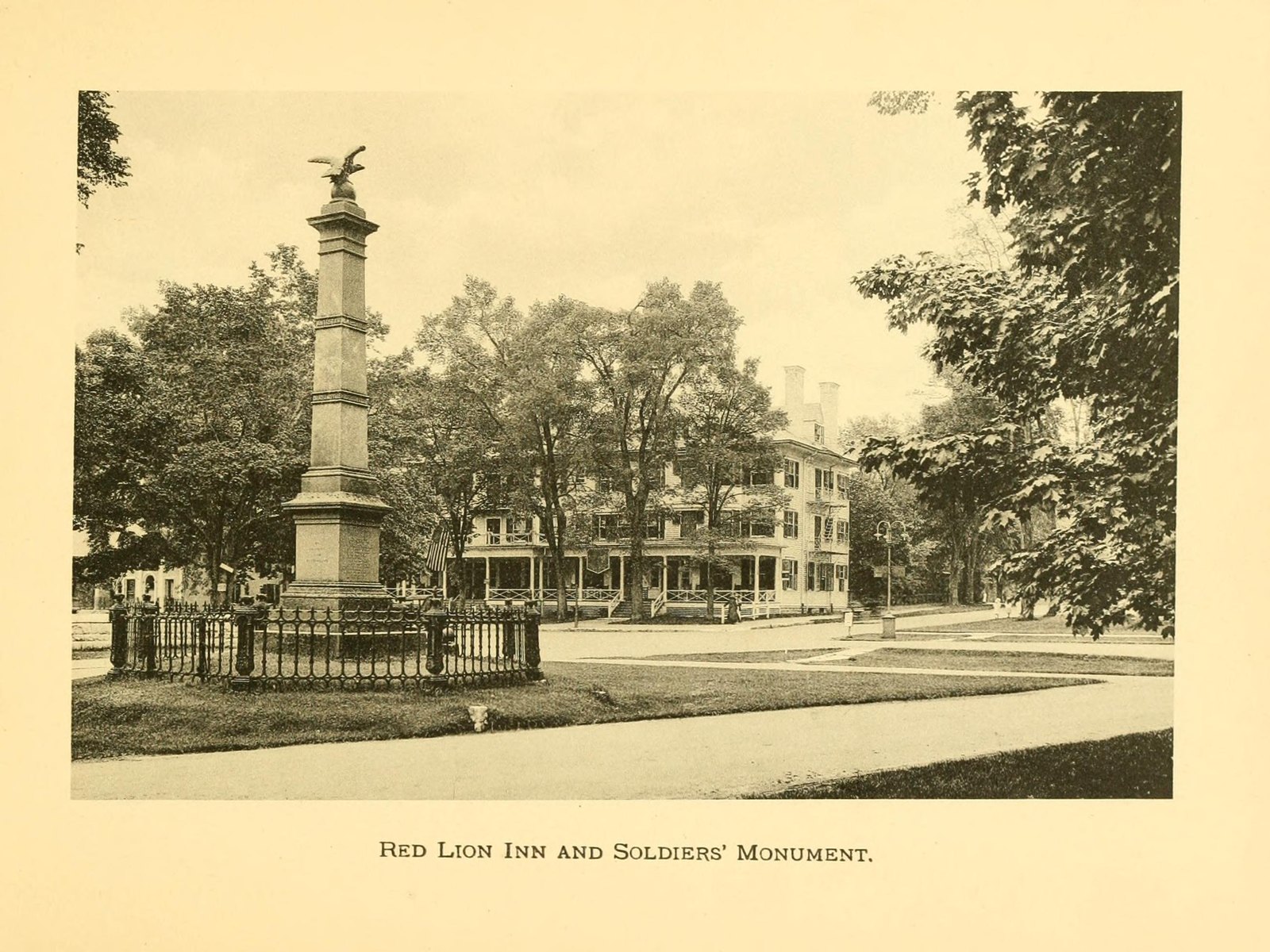 Red Lion Inn and Soldiers’ Monument. The inn of 1897, with its long piazza, from the green.