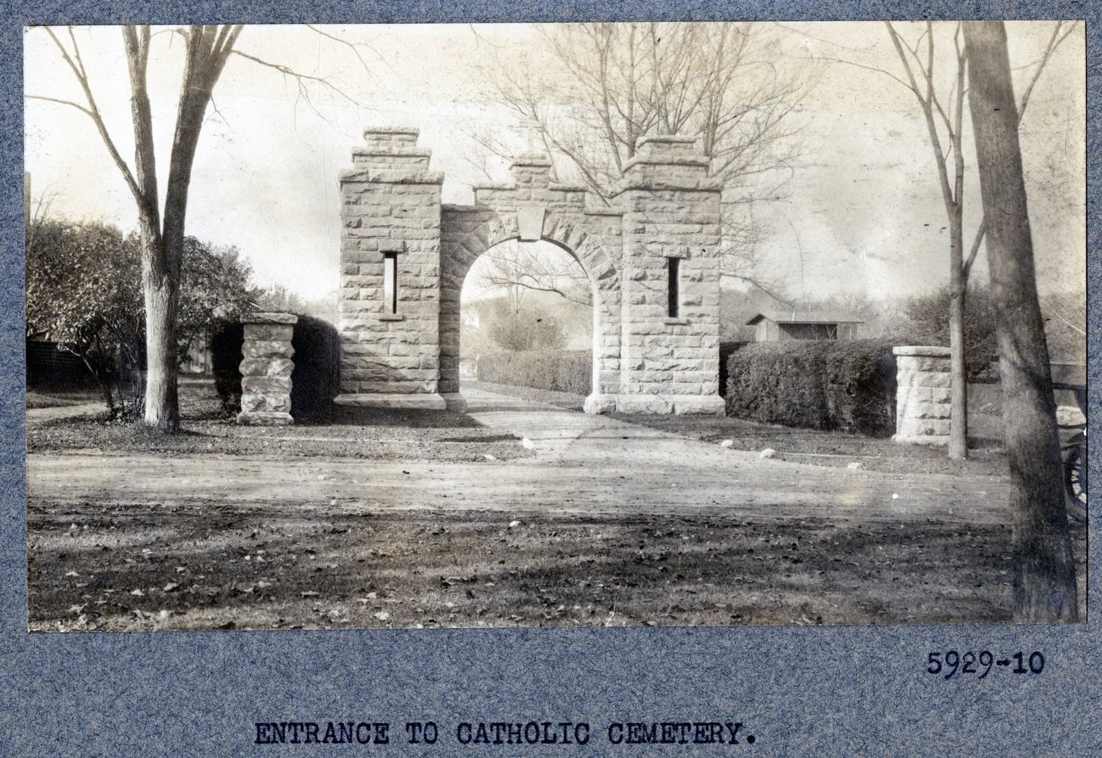 Print 5929-10: “ENTRANCE TO CATHOLIC CEMETERY.”