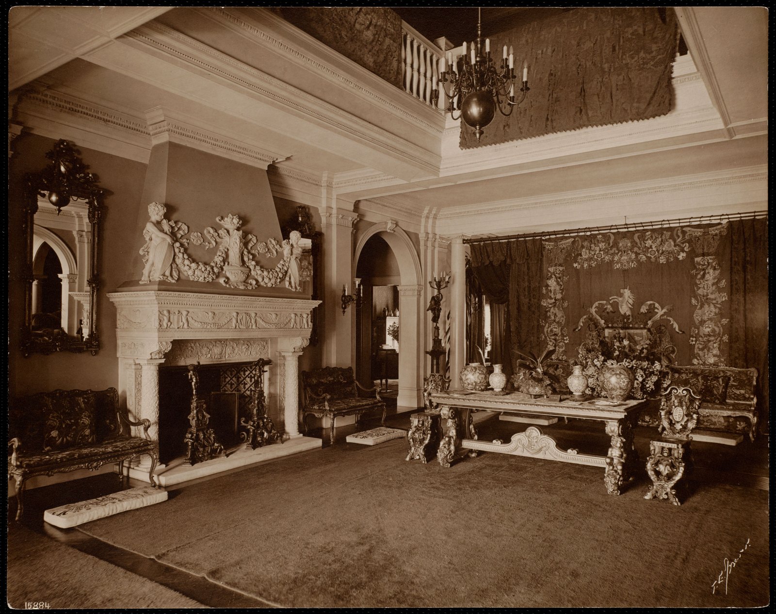 A Wheatleigh interior about 1900: tapestries hung above the wainscot, a set of chairs, a carpet