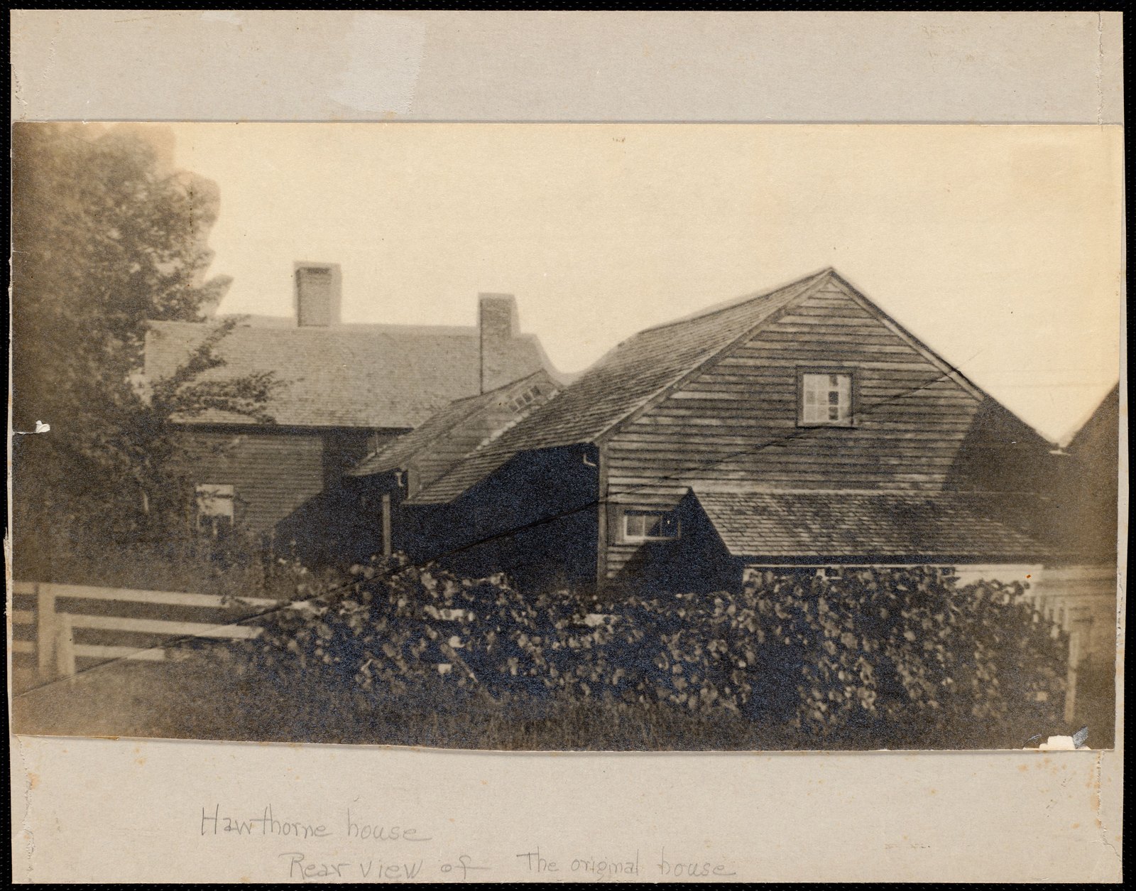 “Hawthorne’s Little Red House: rear view of the original house.” About 1870–1890. The mount is worth turning over: it is a piece of a cardboard sign, printed in red, white, blue and olive with drawings of soldiers, reading “Our men need [text cut off]. Any book you really want to keep is [text cut off]. Leave it at the nearest collection [text cut off].”