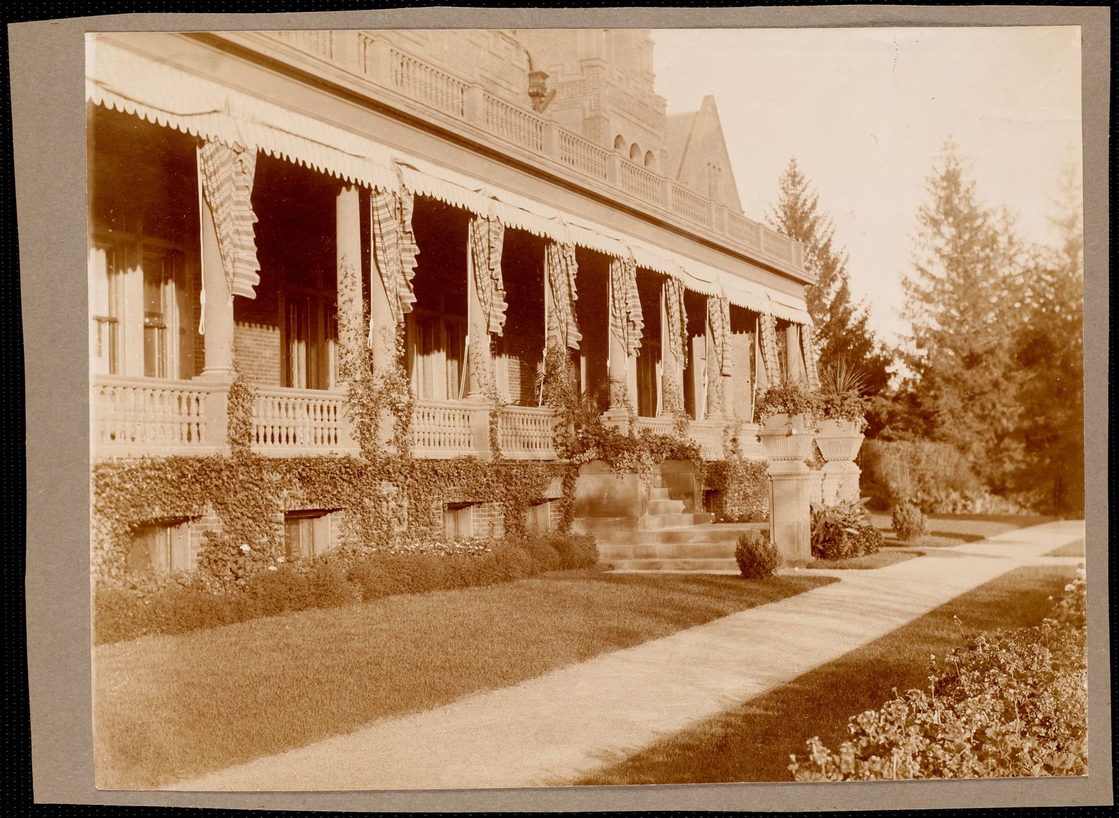 Ventfort Hall: side of house and plants. about 1893–1920.