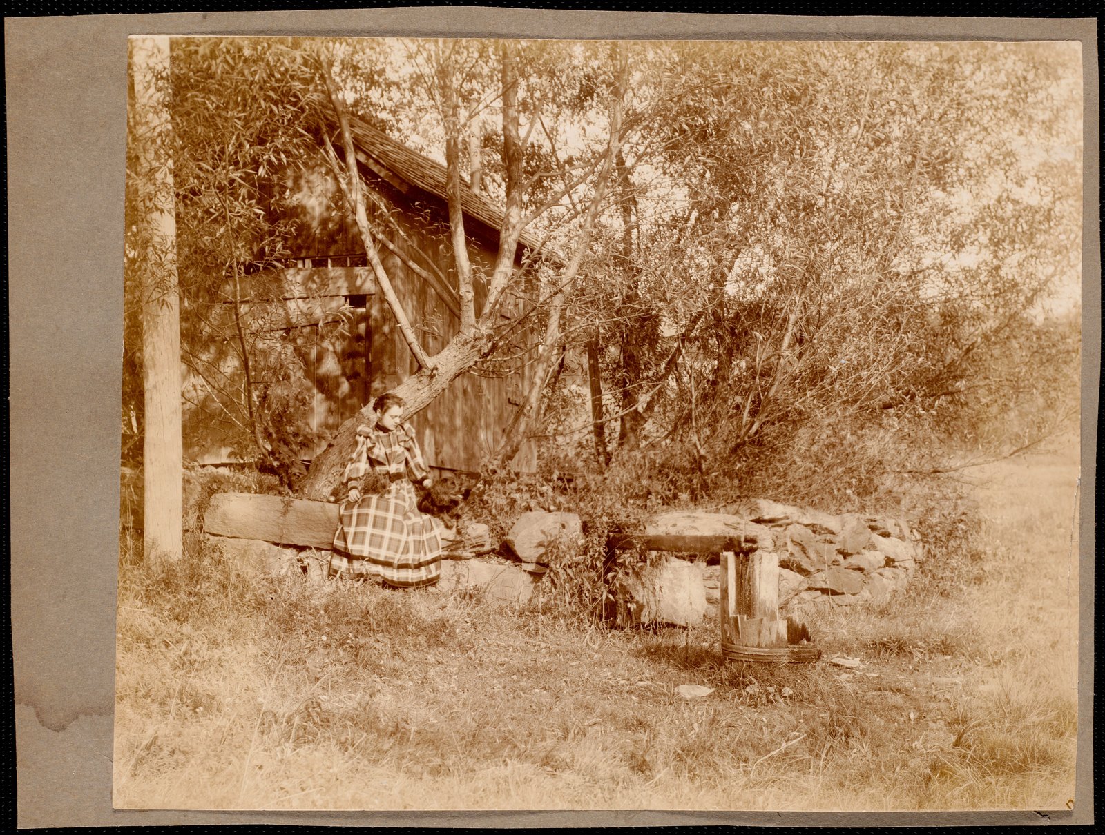 Ventfort Hall: woman by shed. about 1893.