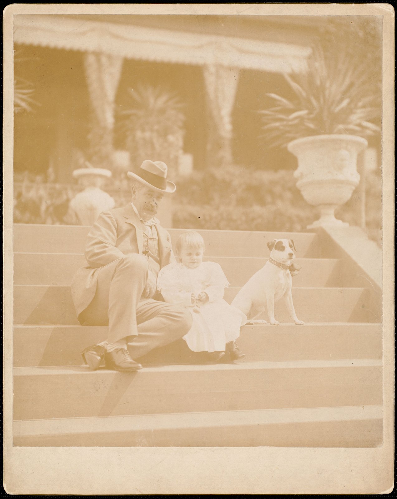 George Morgan, granddaughter Sarah & dog. about 1894–1897.