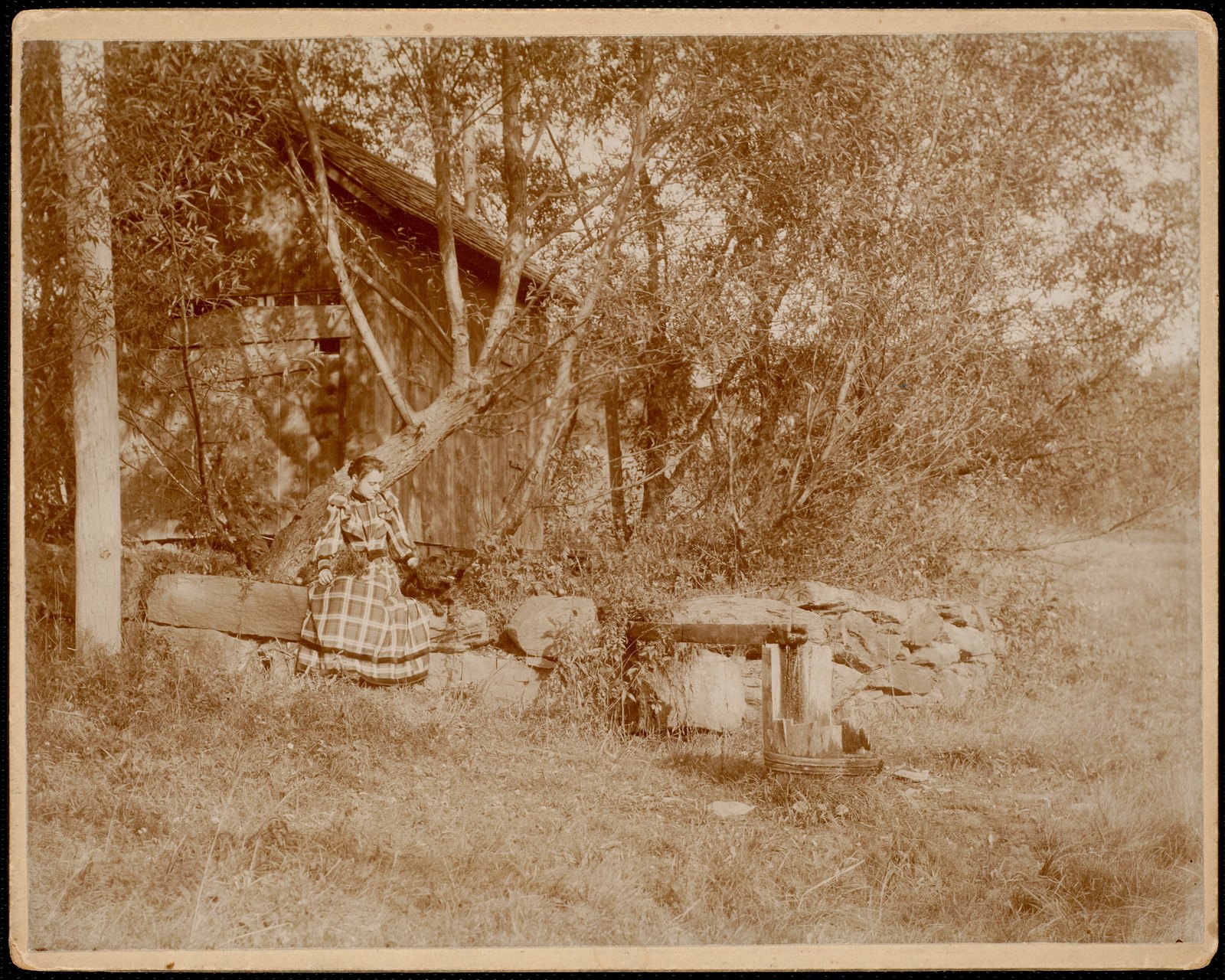 Ventfort Hall: woman by shed. about 1893.