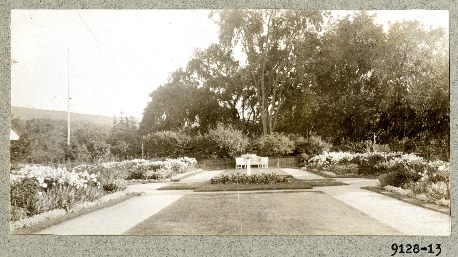 The grass panel and the central feature, looking to the hills. Print 9128-13.