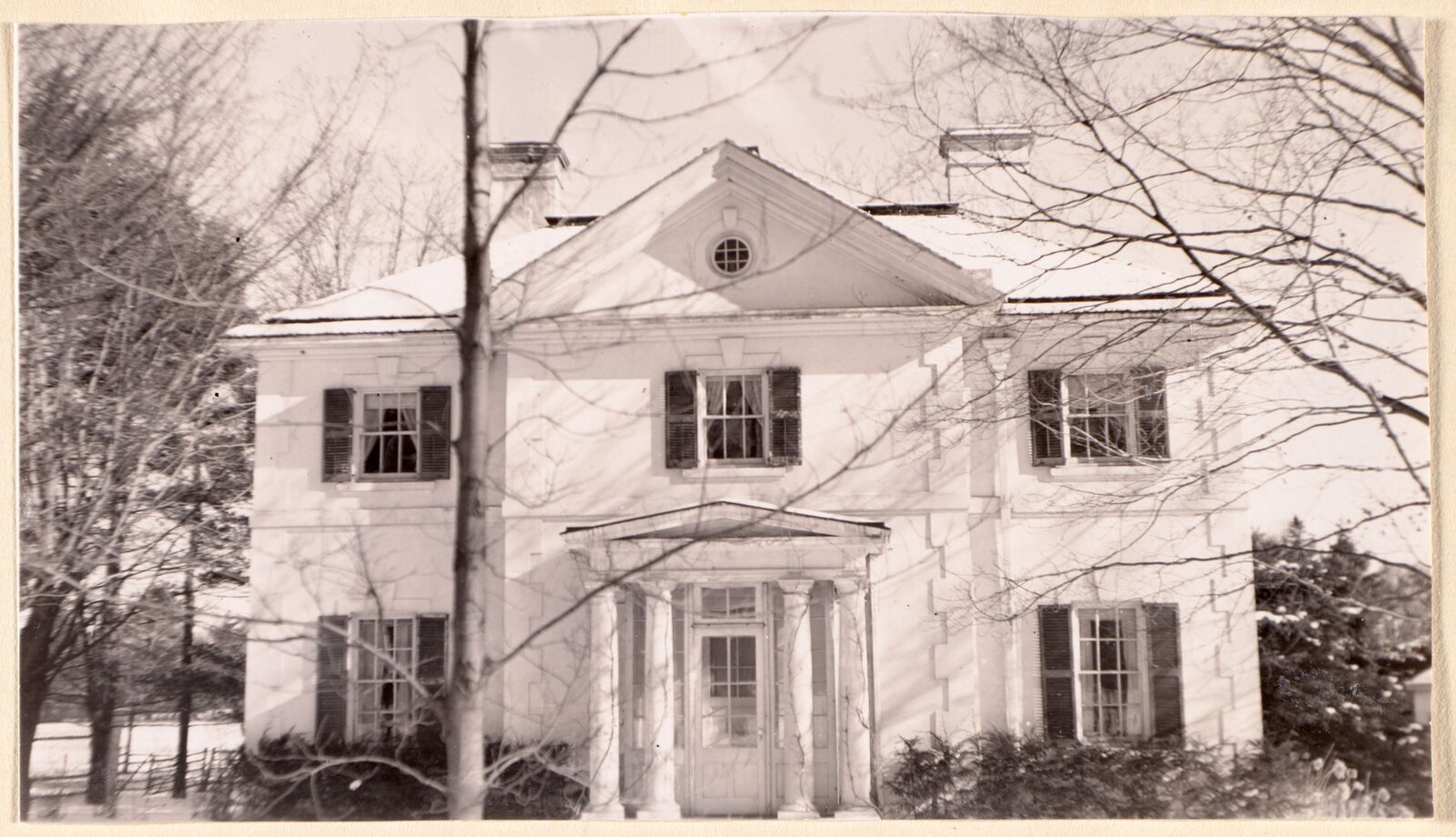 “The Mount: superintendent’s house,” about 8 January 1940. Clapboard, shutters, a pedimented doorway and an oculus over it — a house with architecture on it.